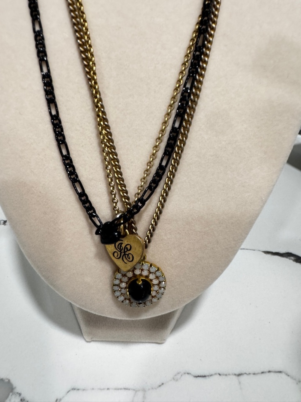 Juicy Couture Multilayered
Black & Gold Necklace